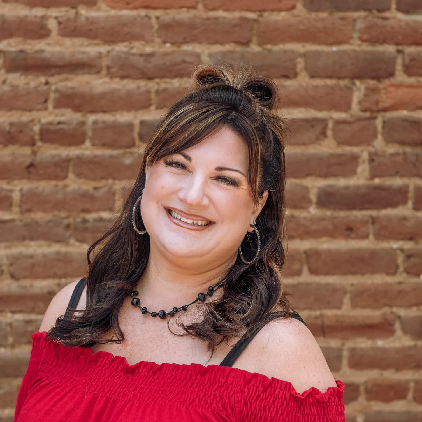 Headshot image of Rachel Benson